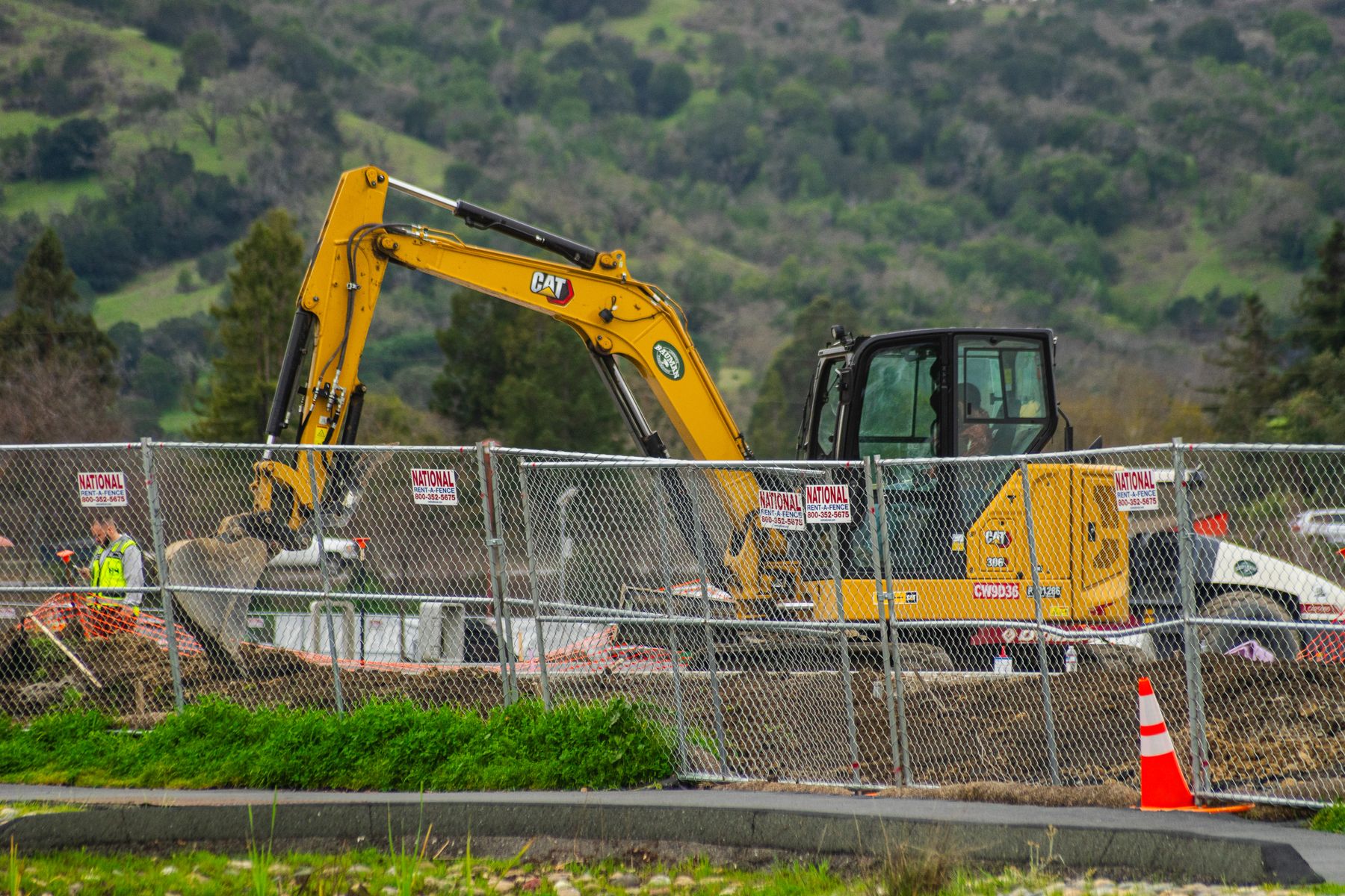 Excavator operating on an active construction site